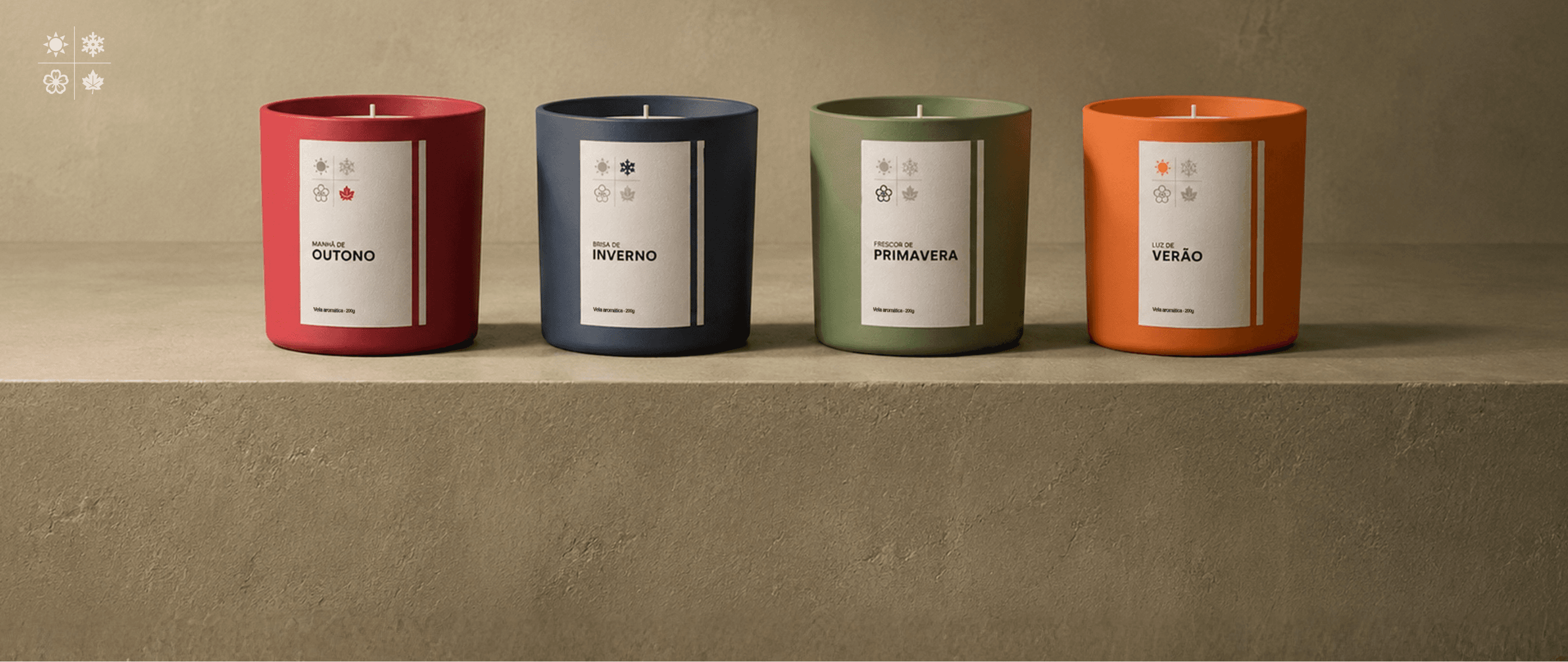 Kit de velas aromáticas 4 Estações da Sensora, com as quatro velas lado a lado sobre uma bancada